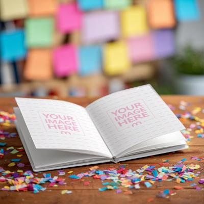 Open Hardcover Book Mockup with Confetti Background