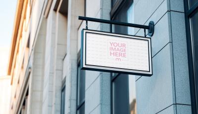 Hanging Shop Sign Mockup on Stone Façade