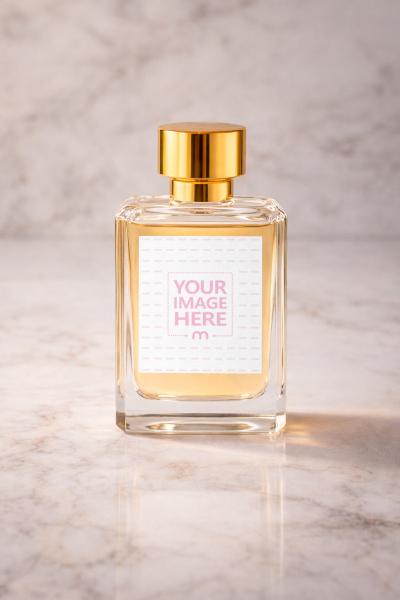 Glass Perfume Bottle Mockup with Gold Cap on Marble Surface