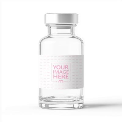 Glass Vial Mockup with Silver Cap and Blank Label