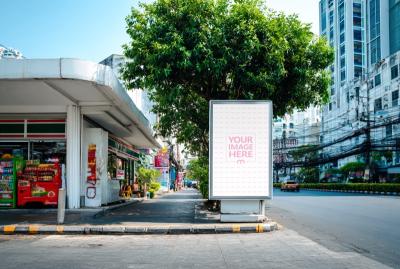 Vertical Street Poster Mockup on Busy City Sidewalk