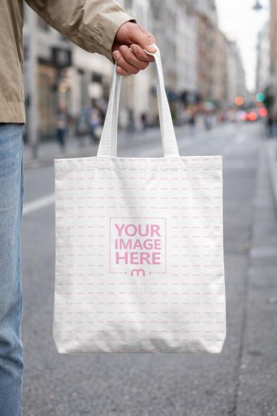 Modern Tote Bag Mockup Held by Person in City Street
