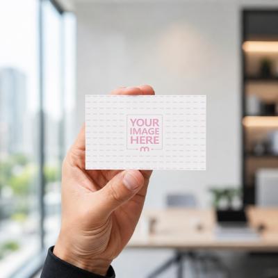 Business Card in Hand Mockup – Customizable Card & Office Background